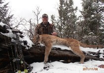 New Mexico mountain lion hunting clients with H&A Outfitters Inc.
