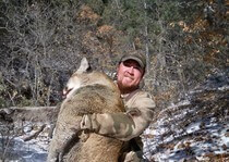 <p>New Mexico mountain lion hunting clients with H&A Outfitters Inc.</p>